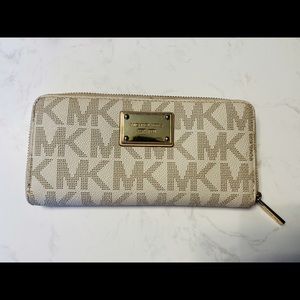 White and gold Michael Kors wallet